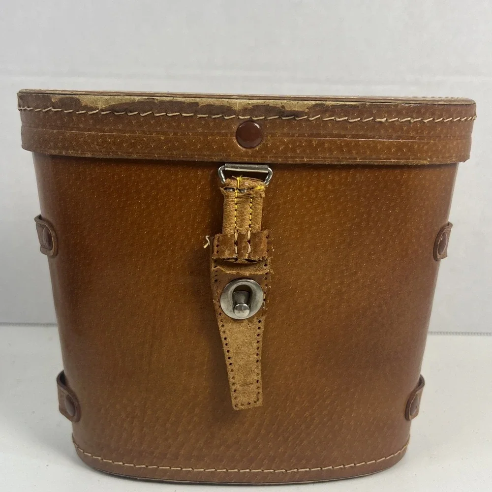 Vintage 50s-60s Tasco binoculars featuring 